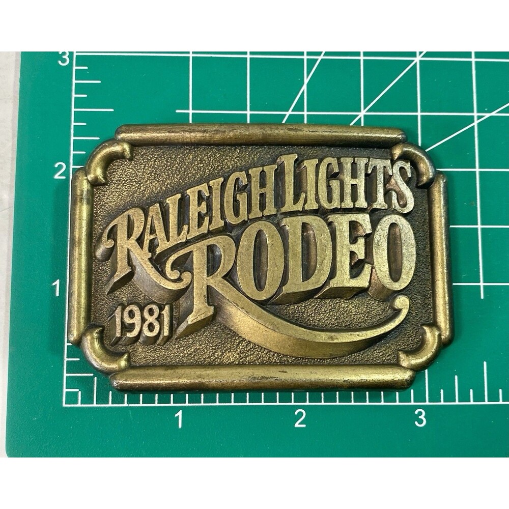 Vintage Raleigh Lights Rodeo Belt Buckle 1981 Brass 3 in - Picture 2 of 4